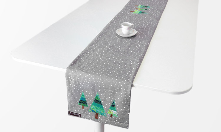 Coser un camino de mesa navideño